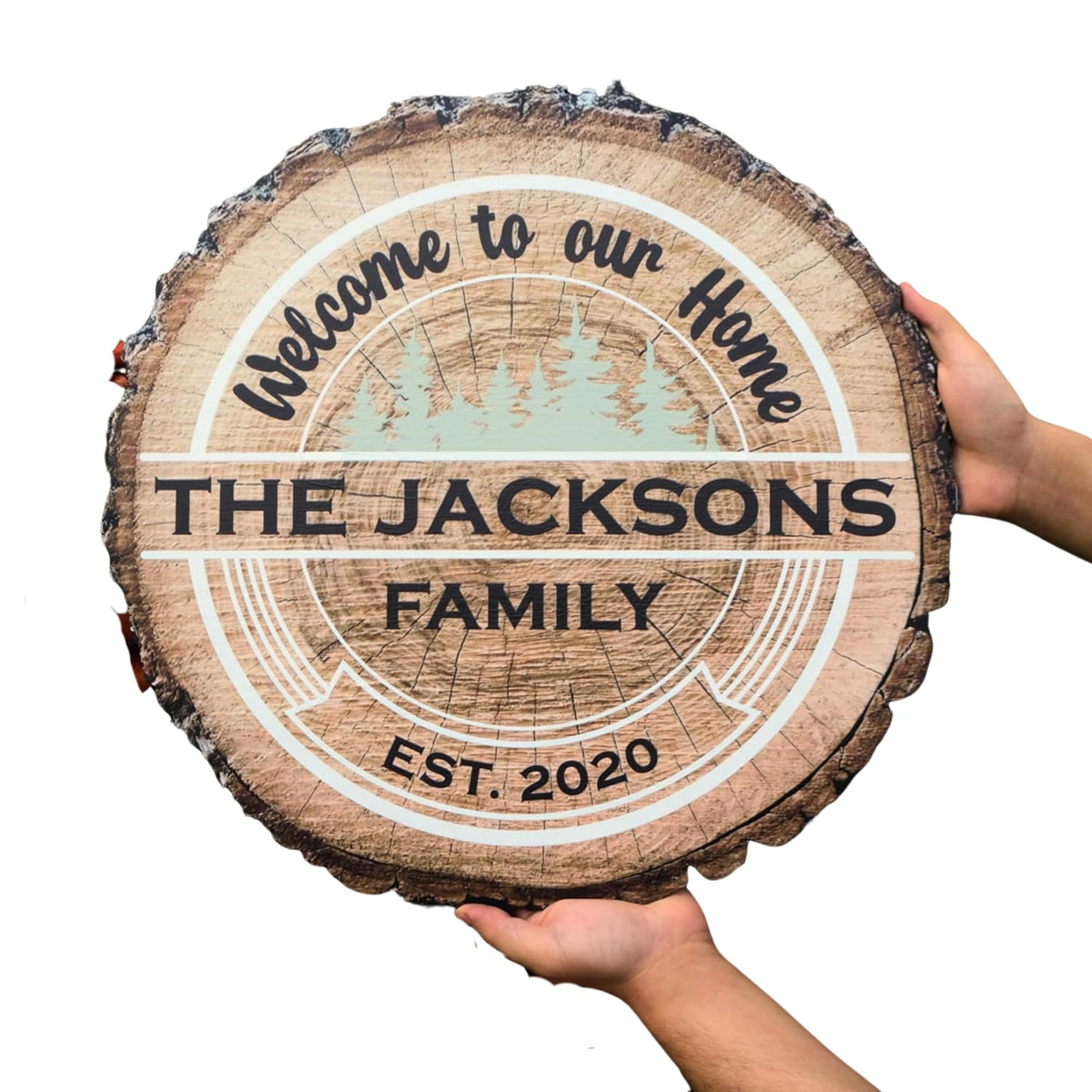 Rustic cabin wood family name sign detail showing raised white lettering and established year