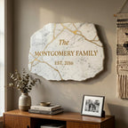 Personalized family name wood sign with gold veined marble texture and raised 3D lettering