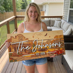 Custom Route 66 family name wood sign hung as living room wall decor