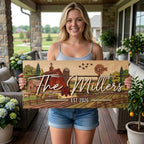 Custom rustic barn family name wood sign hung as living room wall decor