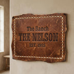 Custom last name sign in western leather finish hung on living room wall