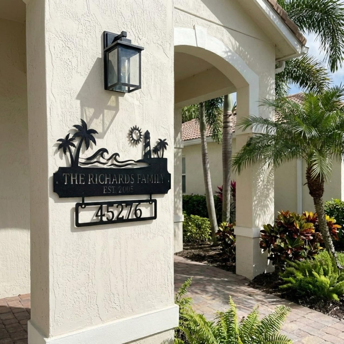 Custom outdoor metal sign with family name and street number