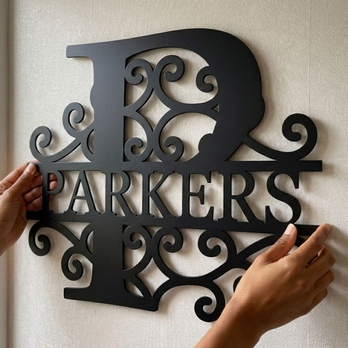Elegant custom monogram in steel – timeless family name sign