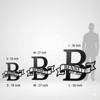 Custom metal last name sign detail – monogram wall decor with established year