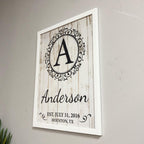 Custom monogram family sign packaged as a housewarming gift